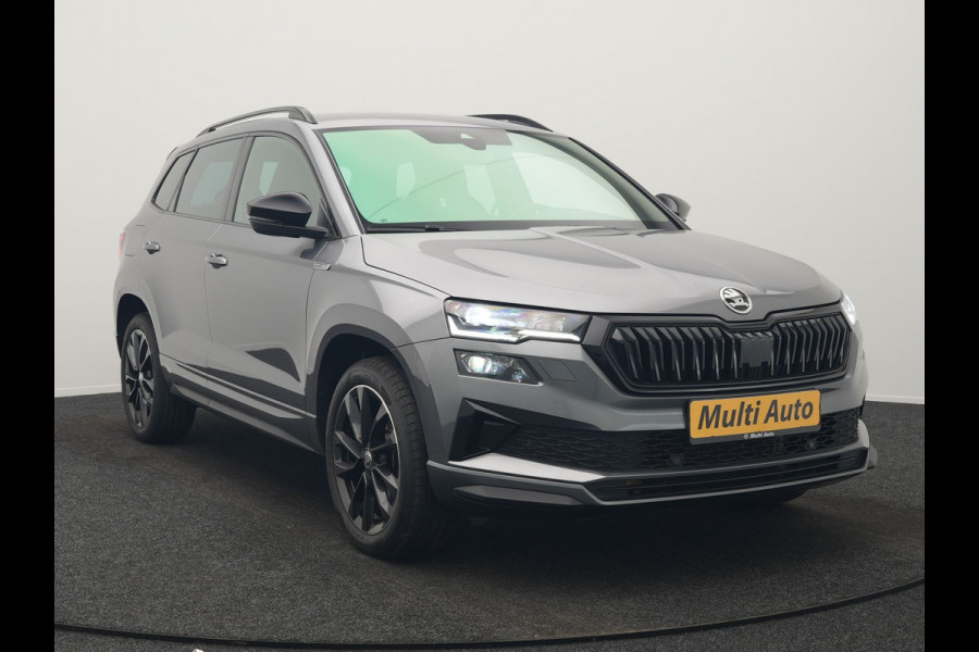 Škoda Karoq 1.5 TSI ACT Sportline Business DSG 150pk | Adaptive Cruise | Camera | Matrix LED | RS Sportstoelen Verwarmd | 18"L.M | Adaptive Onderstel | Keyless | Sfeerverlichting | Apple Carplay | Virtual | Navigatie | DAB |