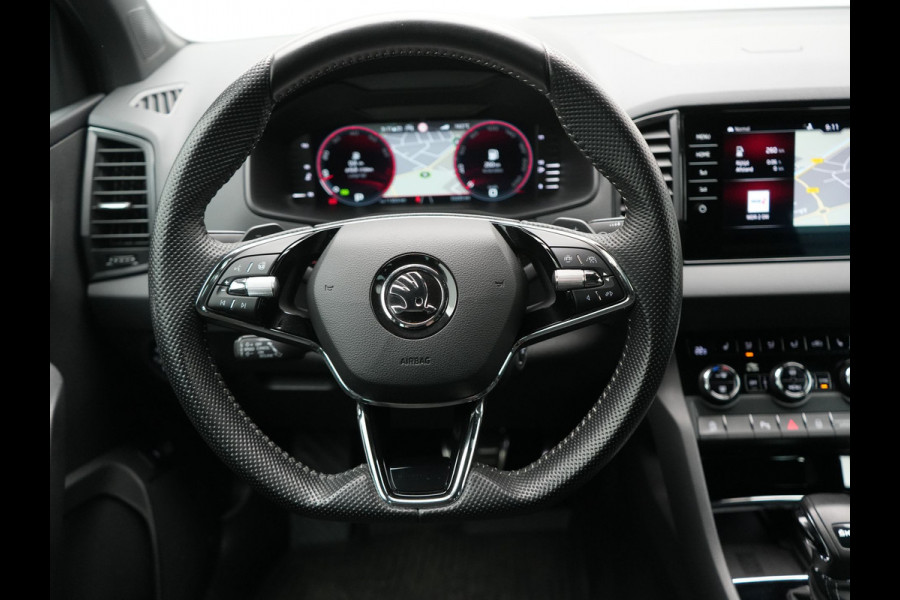 Škoda Karoq 1.5 TSI ACT Sportline Business DSG 150pk | Adaptive Cruise | Camera | Matrix LED | RS Sportstoelen Verwarmd | 18"L.M | Adaptive Onderstel | Keyless | Sfeerverlichting | Apple Carplay | Virtual | Navigatie | DAB |