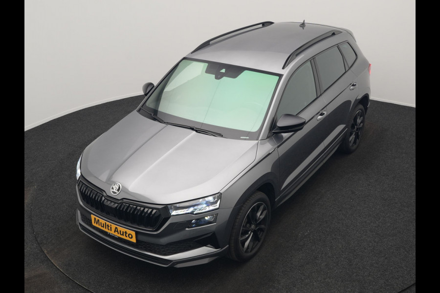 Škoda Karoq 1.5 TSI ACT Sportline Business DSG 150pk | Adaptive Cruise | Camera | Matrix LED | RS Sportstoelen Verwarmd | 18"L.M | Adaptive Onderstel | Keyless | Sfeerverlichting | Apple Carplay | Virtual | Navigatie | DAB |