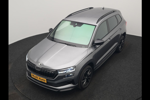Škoda Karoq 1.5 TSI ACT Sportline Business DSG 150pk | Adaptive Cruise | Camera | Matrix LED | RS Sportstoelen Verwarmd | 18"L.M | Adaptive Onderstel | Keyless | Sfeerverlichting | Apple Carplay | Virtual | Navigatie | DAB |