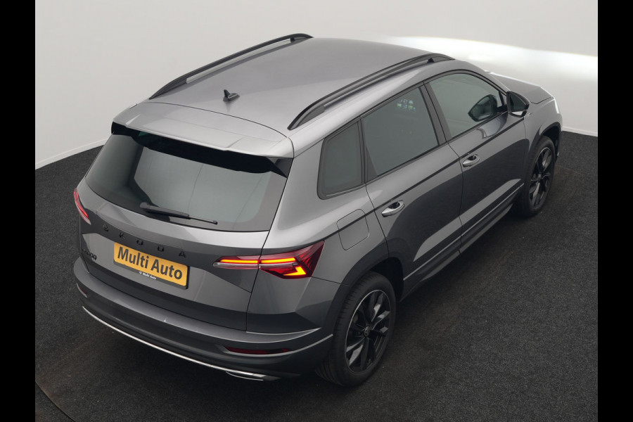 Škoda Karoq 1.5 TSI ACT Sportline Business DSG 150pk | Adaptive Cruise | Camera | Matrix LED | RS Sportstoelen Verwarmd | 18"L.M | Adaptive Onderstel | Keyless | Sfeerverlichting | Apple Carplay | Virtual | Navigatie | DAB |