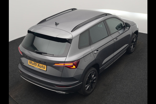 Škoda Karoq 1.5 TSI ACT Sportline Business DSG 150pk | Adaptive Cruise | Camera | Matrix LED | RS Sportstoelen Verwarmd | 18"L.M | Adaptive Onderstel | Keyless | Sfeerverlichting | Apple Carplay | Virtual | Navigatie | DAB |