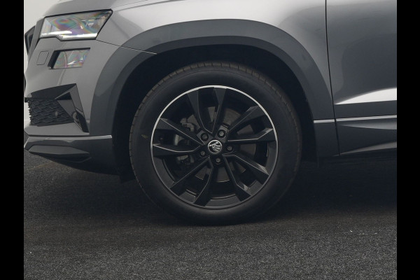 Škoda Karoq 1.5 TSI ACT Sportline Business DSG 150pk | Adaptive Cruise | Camera | Matrix LED | RS Sportstoelen Verwarmd | 18"L.M | Adaptive Onderstel | Keyless | Sfeerverlichting | Apple Carplay | Virtual | Navigatie | DAB |