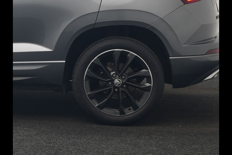 Škoda Karoq 1.5 TSI ACT Sportline Business DSG 150pk | Adaptive Cruise | Camera | Matrix LED | RS Sportstoelen Verwarmd | 18"L.M | Adaptive Onderstel | Keyless | Sfeerverlichting | Apple Carplay | Virtual | Navigatie | DAB |