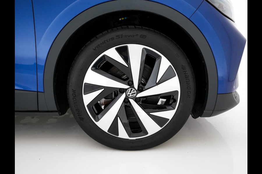 Volkswagen ID.4 First 77 kWh [ 3-Fase-11kW ] {SOH-83%} (INCL-BTW) *LEATHER-MICROFIBRE | FULL-LED | CRUISE | HEATED-COMFORTSEATS | DIGI-COCKPIT | AMBIENTLIGHT | NAVI-FULLMAP | PDC | TOWBAR | PRIVACY-GLASS | CAMERA | 20''ALU*