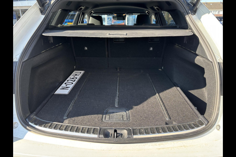 Toyota Corolla Touring Sports 1.8 Hybrid GR-Sport | SCI | 122pk | Trekhaak | Adaptieve Cruise | Stoelverwarming | 18 inch velgen | Full LED