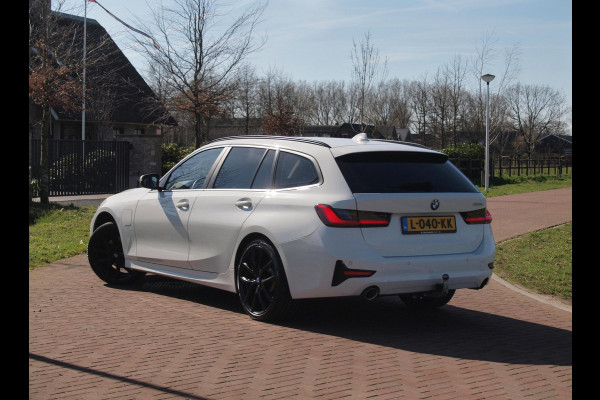 BMW 3 Serie Touring 320e Business Edition Plus | 19 Inch Velgen | Trekhaak | Laser Led koplampen | NL-Auto |