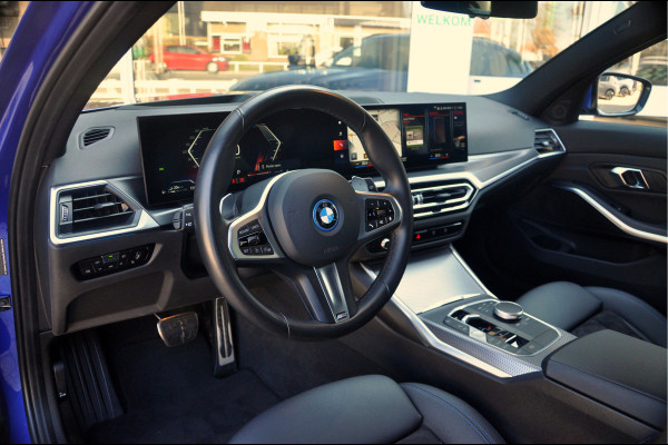 BMW 3 Serie Touring 330e M-Sport | HUD | Trekhaak | Garantie t/m 15-01-2029!