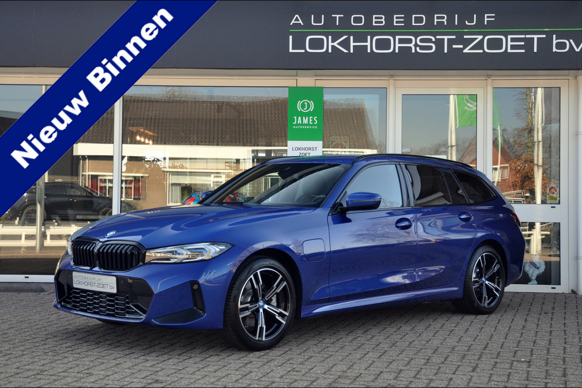 BMW 3 Serie Touring 330e M-Sport | HUD | Trekhaak | Garantie t/m 15-01-2029!