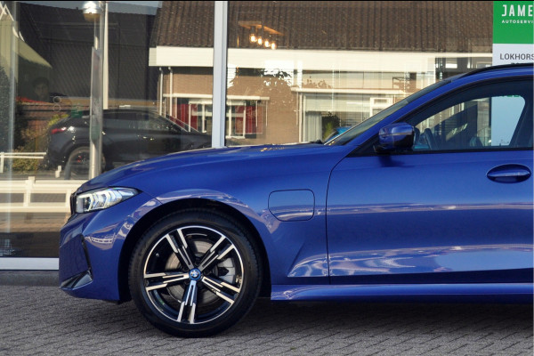 BMW 3 Serie Touring 330e M-Sport | HUD | Trekhaak | Garantie t/m 15-01-2029!