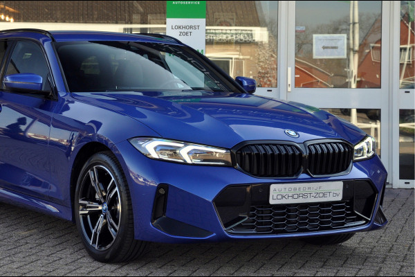 BMW 3 Serie Touring 330e M-Sport | HUD | Trekhaak | Garantie t/m 15-01-2029!
