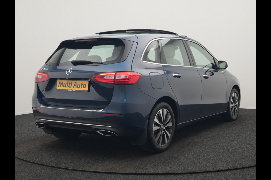 Mercedes-Benz B-Klasse 250 e Progressive PHEV 218pk Dealer O.H. | Trekhaak Af Fabriek | Panodak | Camera | Lederen Sportstoelen Memory & Verwarmd | Apple Carplay | Keyless | Cruise Control | Navigatie | DAB | Plug In Hybrid