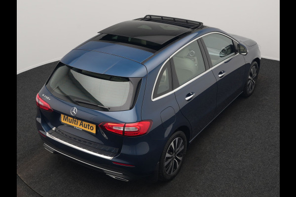 Mercedes-Benz B-Klasse 250 e Progressive PHEV 218pk Dealer O.H. | Trekhaak Af Fabriek | Panodak | Camera | Lederen Sportstoelen Memory & Verwarmd | Apple Carplay | Keyless | Cruise Control | Navigatie | DAB | Plug In Hybrid