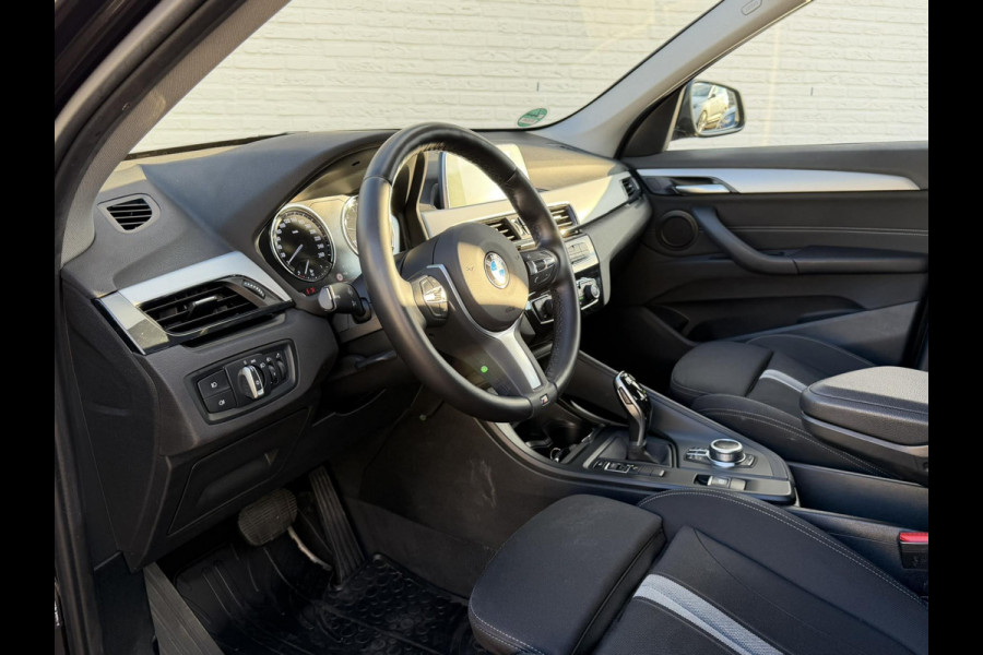BMW X1 SDrive18i Automaat Clima Cruise Navi Pdc V+A Stoelverwarming Elek. A-klep