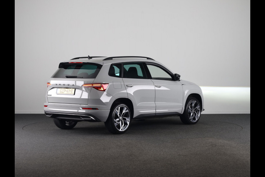 Škoda Karoq 1.5 TSI ACT Sportline Business 150pk | Wegklapbare trekhaak | Navigatie via APP | Verlengde garantie | Verwambare stoelen voor en achter