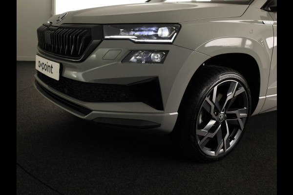 Škoda Karoq 1.5 TSI ACT Sportline Business 150pk | Wegklapbare trekhaak | Navigatie via APP | Verlengde garantie | Verwambare stoelen voor en achter