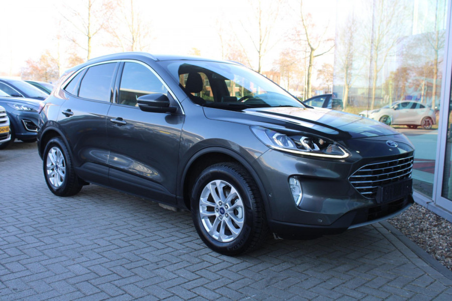 Ford Kuga 2.5 PHEV Titanium | Wegklapbare trekhaak | Winter Pack | Adaptive cruise control | Dodehoeksensoren | Elektrische achterklep | Head up Display