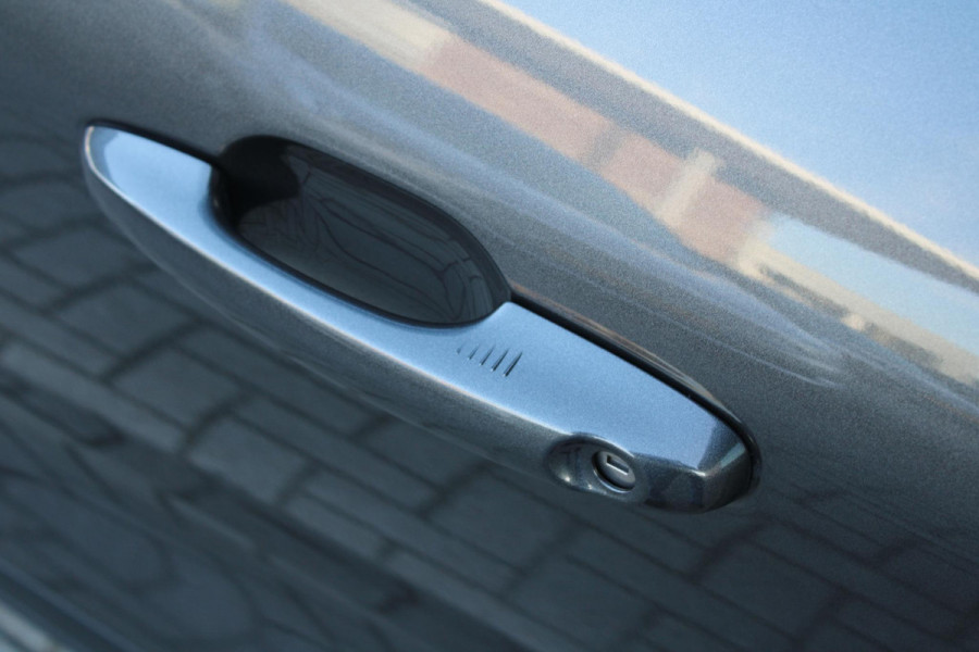 Ford Kuga 2.5 PHEV Titanium | Wegklapbare trekhaak | Winter Pack | Adaptive cruise control | Dodehoeksensoren | Elektrische achterklep | Head up Display