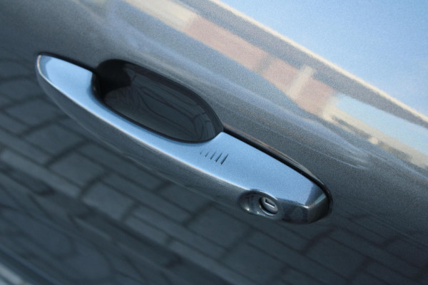 Ford Kuga 2.5 PHEV Titanium | Wegklapbare trekhaak | Winter Pack | Adaptive cruise control | Dodehoeksensoren | Elektrische achterklep | Head up Display