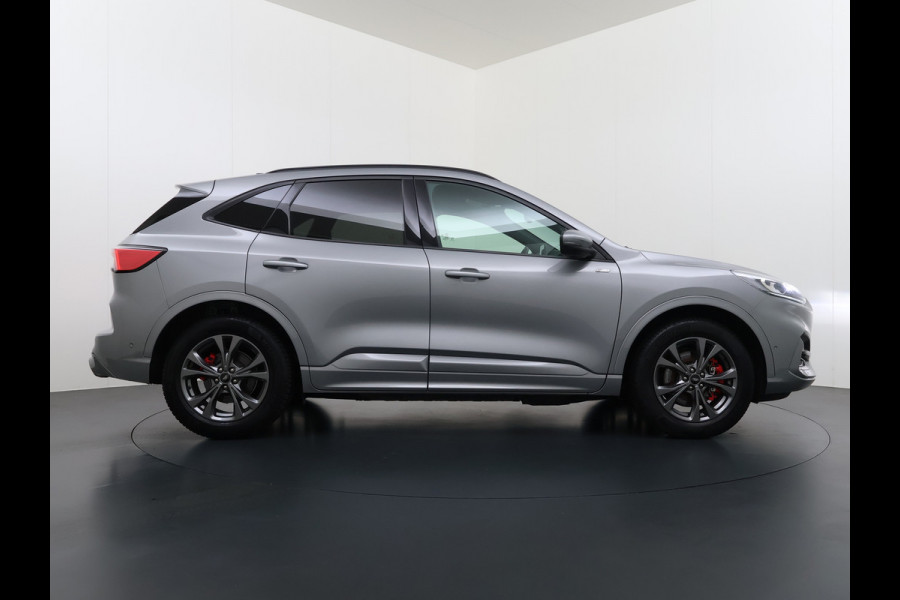 Ford Kuga 2.5 Hybrid PHEV ST-Line X Trekhaak Navi Head-Up Display Adap.Cruise Ecc Camera Stoel+Achterbankverwarming Apple Carplay Android  Privacy Glas Winterpakket Elek.Achterklep Led Virtual Cockpit Dodehoek-assistent 1.500KG Trekgewicht 1e Eigenaar Dealeronderhouden