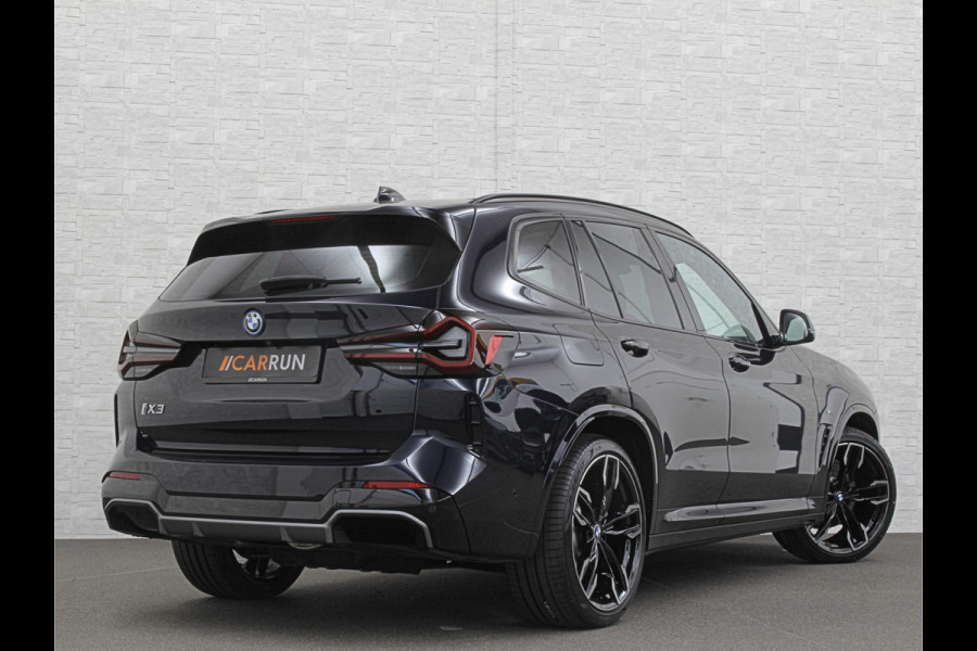 BMW iX3 M-Sport 80 kWh | Panorama | Leder | 99% SOH | ACC | Trekhaak | Memory | Camera | 3-Zone Clima | Carplay | Getint Glas | Black-Optic | Stoelverwarming | Draadloos Laden | Bovag Garantie |