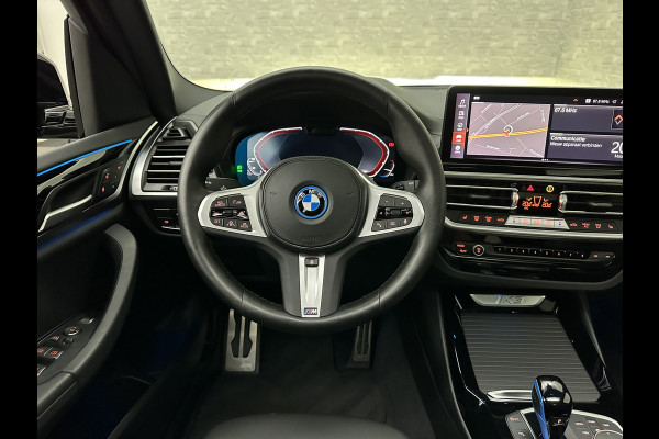 BMW iX3 M-Sport 80 kWh | Panorama | Leder | 99% SOH | ACC | Trekhaak | Memory | Camera | 3-Zone Clima | Carplay | Getint Glas | Black-Optic | Stoelverwarming | Draadloos Laden | Bovag Garantie |