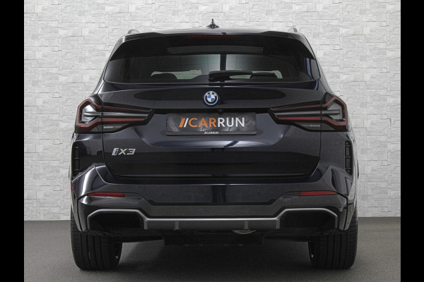 BMW iX3 M-Sport 80 kWh | Panorama | Leder | 99% SOH | ACC | Trekhaak | Memory | Camera | 3-Zone Clima | Carplay | Getint Glas | Black-Optic | Stoelverwarming | Draadloos Laden | Bovag Garantie |