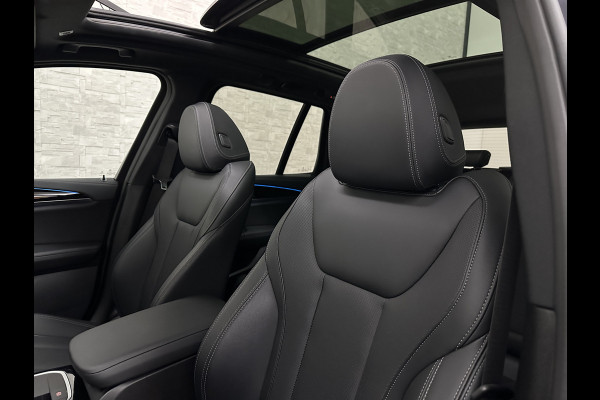 BMW iX3 M-Sport 80 kWh | Panorama | Leder | 99% SOH | ACC | Trekhaak | Memory | Camera | 3-Zone Clima | Carplay | Getint Glas | Black-Optic | Stoelverwarming | Draadloos Laden | Bovag Garantie |