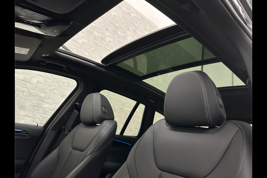 BMW iX3 M-Sport 80 kWh | Panorama | Leder | 99% SOH | ACC | Trekhaak | Memory | Camera | 3-Zone Clima | Carplay | Getint Glas | Black-Optic | Stoelverwarming | Draadloos Laden | Bovag Garantie |