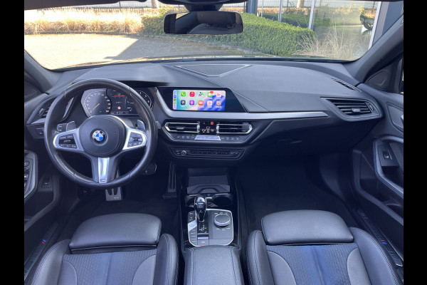 BMW 1-serie M135i xDrive High Executive M Sport 306pk Automaat | Panodak | Elektr. achterklep | arking Pakket | Spiegel Pakket | Draadloze telefoonlader | etc. etc.