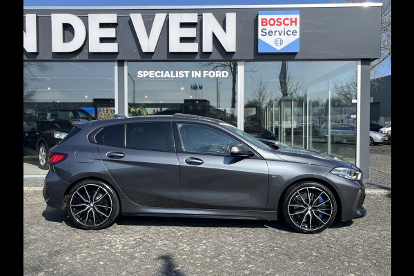 BMW 1-serie M135i xDrive High Executive M Sport 306pk Automaat | Panodak | Elektr. achterklep | arking Pakket | Spiegel Pakket | Draadloze telefoonlader | etc. etc.