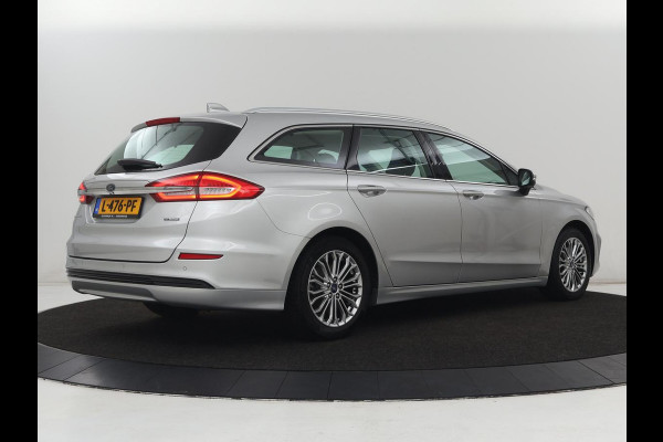 Ford Mondeo 2.0 IVCT HEV Titanium | Stoelverwarming | Carplay | Keyless | Navigatie | Verwarmde voorruit | Parkeerhulp | DAB | Climate control | Cruise control
