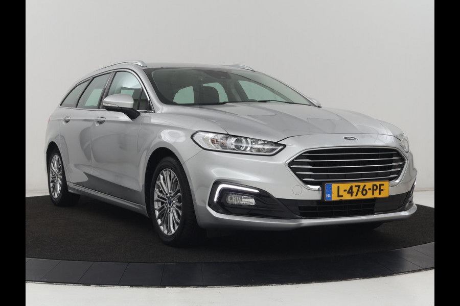 Ford Mondeo 2.0 IVCT HEV Titanium | Stoelverwarming | Carplay | Keyless | Navigatie | Verwarmde voorruit | Parkeerhulp | DAB | Climate control | Cruise control