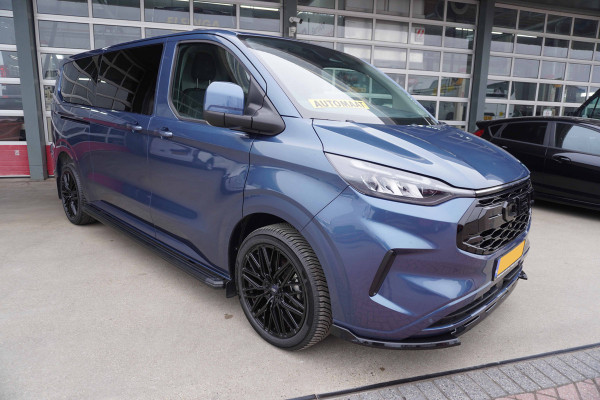 Ford Transit Custom 320L 2.0 TDCI 170PK L2H1 Limited Automaat Nr. V018 | Airco | adap.Cruise | Navi | Camera | Blis |20 inch Lm Velgen Raptor grill /Site steps met verlichting