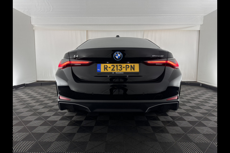 BMW i4 eDrive40 High Executive 84 kWh [ 3-Fase-11kW ] {SOH-95%} (INCL.BTW) Aut. *HEATPUMP | LEATHER | FULL-LED | DIGI-COCKPIT | HEATED-SPORTSEATS | CAMERA | KEYLESS | HIFI-SOUND | PRIVACYGLASS | ECC | AMBIENTLIGHT | PDC | HEAD-UP | CRUISE | 17''ALU*