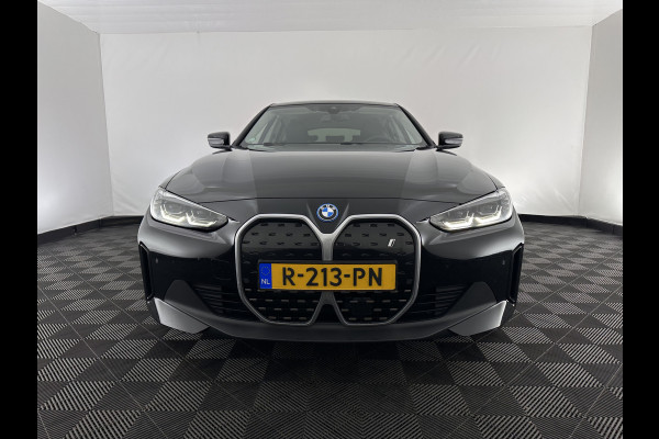BMW i4 eDrive40 High Executive 84 kWh [ 3-Fase-11kW ] {SOH-95%} (INCL.BTW) Aut. *HEATPUMP | LEATHER | FULL-LED | DIGI-COCKPIT | HEATED-SPORTSEATS | CAMERA | KEYLESS | HIFI-SOUND | PRIVACYGLASS | ECC | AMBIENTLIGHT | PDC | HEAD-UP | CRUISE | 17''ALU*