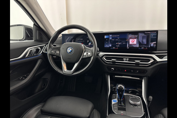 BMW i4 eDrive40 High Executive 84 kWh [ 3-Fase-11kW ] {SOH-95%} (INCL.BTW) Aut. *HEATPUMP | LEATHER | FULL-LED | DIGI-COCKPIT | HEATED-SPORTSEATS | CAMERA | KEYLESS | HIFI-SOUND | PRIVACYGLASS | ECC | AMBIENTLIGHT | PDC | HEAD-UP | CRUISE | 17''ALU*
