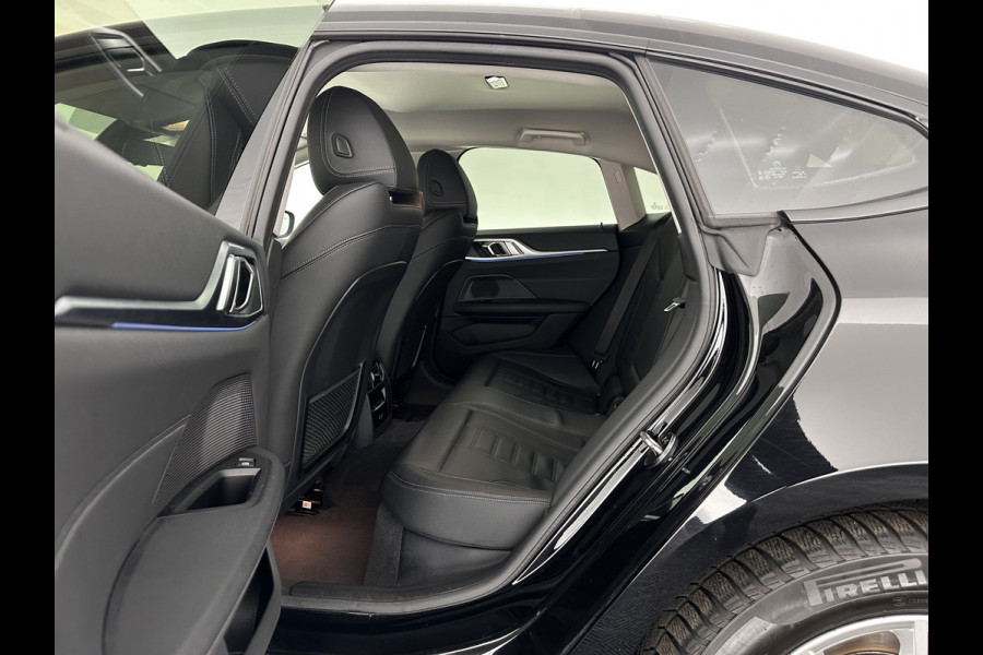 BMW i4 eDrive40 High Executive 84 kWh [ 3-Fase-11kW ] {SOH-95%} (INCL.BTW) Aut. *HEATPUMP | LEATHER | FULL-LED | DIGI-COCKPIT | HEATED-SPORTSEATS | CAMERA | KEYLESS | HIFI-SOUND | PRIVACYGLASS | ECC | AMBIENTLIGHT | PDC | HEAD-UP | CRUISE | 17''ALU*