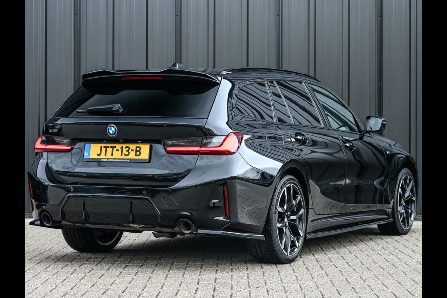 BMW 3 Serie Touring 330e xDrive M sport Accu 19,5kWh | Trekhaak | Panorama dak | Active Cruise  | Camera  | Ambiance interieur