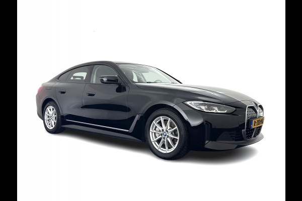 BMW i4 eDrive40 High Executive 84 kWh [ 3-Fase-11kW ] {SOH-95%} (INCL.BTW) Aut. *HEATPUMP | LEATHER | FULL-LED | DIGI-COCKPIT | HEATED-SPORTSEATS | CAMERA | KEYLESS | HIFI-SOUND | PRIVACYGLASS | ECC | AMBIENTLIGHT | PDC | HEAD-UP | CRUISE | 17''ALU*