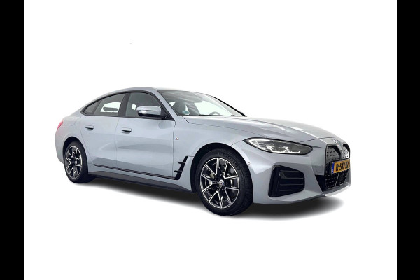 BMW i4 eDrive40 84 kWh M-Sport *M50 JAHRE* [ 3-Fase-11 kW ] {SOH-96%} (INCL-BTW) *LEATHER-ALCANTARA | FULL-LED | ADAPTIVE-CRUISE | HEATED-SPORTSEATS | CAMERA | DAB | DIGI-COCKPIT | NAVI-FULLMAP | AMBIENT-LIGHT | ECC | PDC | CARPLAY | KEYLESS | SHIFTPADDLES | 18