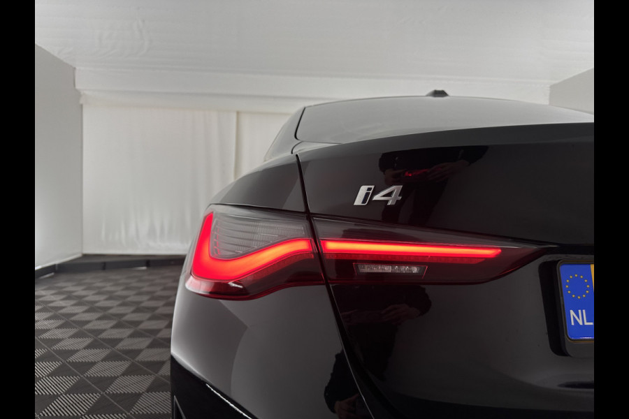 BMW i4 eDrive40 High Executive 84 kWh [ 3-Fase-11kW ] {SOH-95%} (INCL.BTW) Aut. *HEATPUMP | LEATHER | FULL-LED | DIGI-COCKPIT | HEATED-SPORTSEATS | CAMERA | KEYLESS | HIFI-SOUND | PRIVACYGLASS | ECC | AMBIENTLIGHT | PDC | HEAD-UP | CRUISE | 17''ALU*