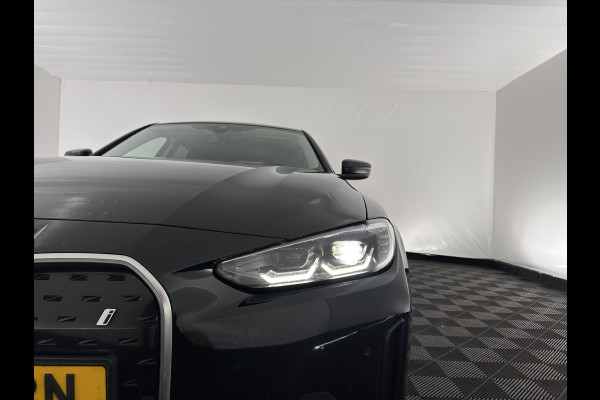 BMW i4 eDrive40 High Executive 84 kWh [ 3-Fase-11kW ] {SOH-95%} (INCL.BTW) Aut. *HEATPUMP | LEATHER | FULL-LED | DIGI-COCKPIT | HEATED-SPORTSEATS | CAMERA | KEYLESS | HIFI-SOUND | PRIVACYGLASS | ECC | AMBIENTLIGHT | PDC | HEAD-UP | CRUISE | 17''ALU*