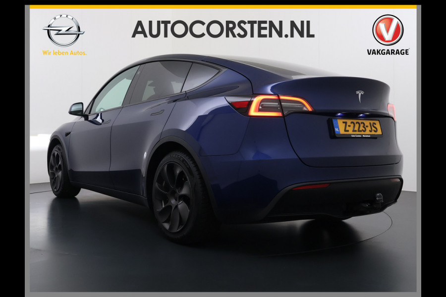 Tesla Model Y 300pk Trekhaak SOH 92% Warmtepomp LFP-Accu Leer Lmv Camera's Panoramadak Adap.Cruise Navi Ecc RWD Autopilot Stoel+Stuur+Achterbank Verwarming Elek.Achterklep Dodehoek detector Draadloze telefoonlader 1e Eigenaar 1.600KG Trekgewicht Fabrieksgarantie op Motor en Accu tot 22-04-2032/160.000km