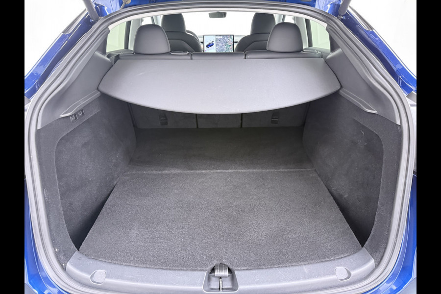 Tesla Model Y 300pk Trekhaak SOH 92% Warmtepomp LFP-Accu Leer Lmv Camera's Panoramadak Adap.Cruise Navi Ecc RWD Autopilot Stoel+Stuur+Achterbank Verwarming Elek.Achterklep Dodehoek detector Draadloze telefoonlader 1e Eigenaar 1.600KG Trekgewicht Fabrieksgarantie op Motor en Accu tot 22-04-2032/160.000km