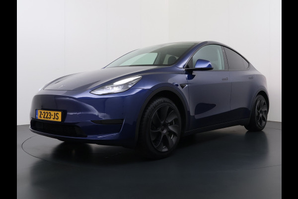 Tesla Model Y 300pk Trekhaak SOH 92% Warmtepomp LFP-Accu Leer Lmv Camera's Panoramadak Adap.Cruise Navi Ecc RWD Autopilot Stoel+Stuur+Achterbank Verwarming Elek.Achterklep Dodehoek detector Draadloze telefoonlader 1e Eigenaar 1.600KG Trekgewicht Fabrieksgarantie op Motor en Accu tot 22-04-2032/160.000km