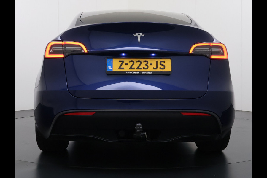 Tesla Model Y 300pk Trekhaak SOH 92% Warmtepomp LFP-Accu Leer Lmv Camera's Panoramadak Adap.Cruise Navi Ecc RWD Autopilot Stoel+Stuur+Achterbank Verwarming Elek.Achterklep Dodehoek detector Draadloze telefoonlader 1e Eigenaar 1.600KG Trekgewicht Fabrieksgarantie op Motor en Accu tot 22-04-2032/160.000km