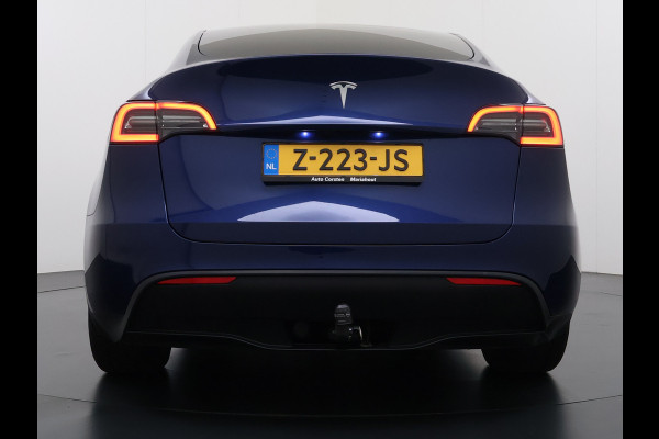 Tesla Model Y 300pk Trekhaak SOH 92% Warmtepomp LFP-Accu Leer Lmv Camera's Panoramadak Adap.Cruise Navi Ecc RWD Autopilot Stoel+Stuur+Achterbank Verwarming Elek.Achterklep Dodehoek detector Draadloze telefoonlader 1e Eigenaar 1.600KG Trekgewicht Fabrieksgarantie op Motor en Accu tot 22-04-2032/160.000km