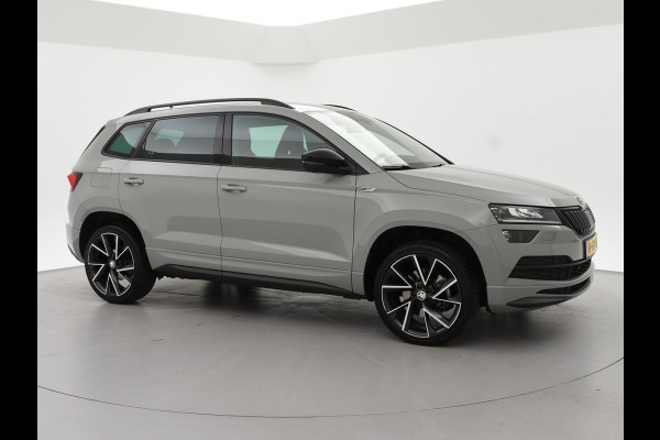 Škoda Karoq 1.5 TSI ACT 150 PK DSG SPORTLINE + CANTON AUDIO | STEEL GREY | CAMERA | 19 INCH | VIRTUAL | SFEER