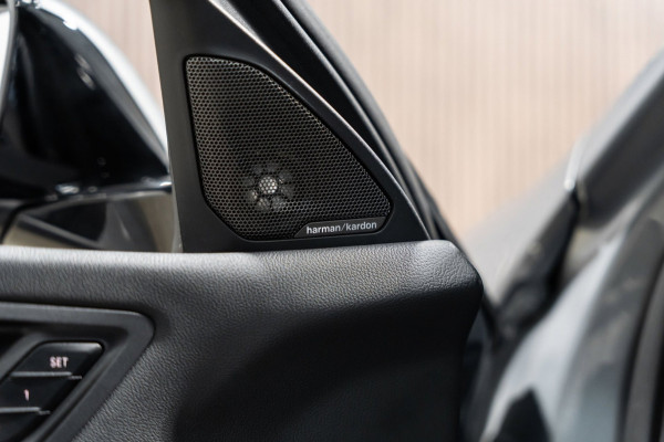BMW 1-serie 118i M-Sport Pano HUD HK Muziek Kuipstoelen BTW